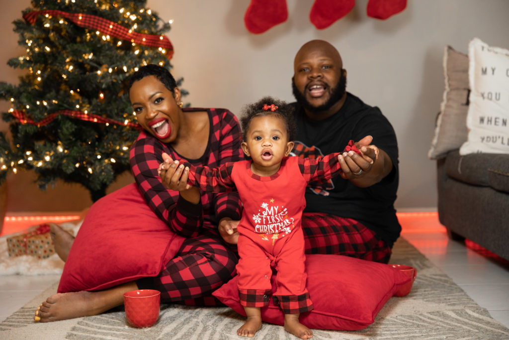 matching pajamas Buffalo plaid  Black family Christmas photoshoot